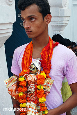 Armaments to escort the deity of Panchetgarh during the procession of �Rasyatra' Photo: Arindam Bhowmik